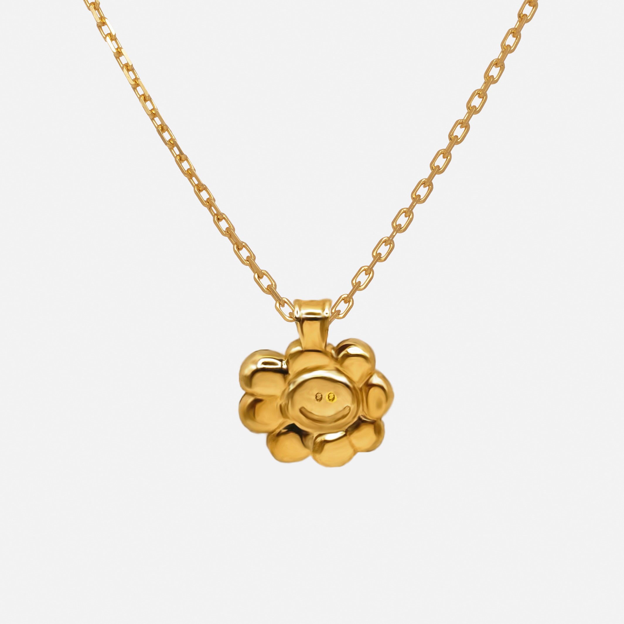 Smiley-flower-necklace-gold-front_copy.jpg